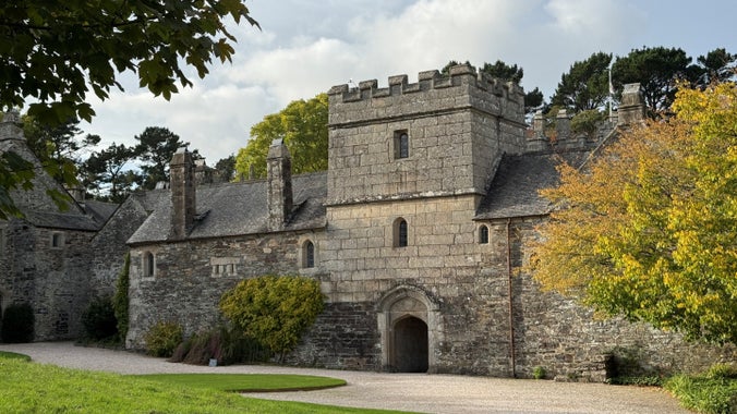 View of the house at Cotehele amongst the autumnal leaves
